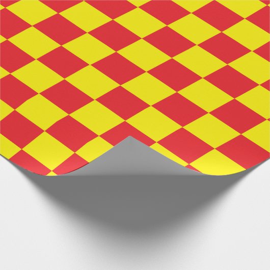 Geel en rood, gecontroleerd cadeaupapier (Hoek)