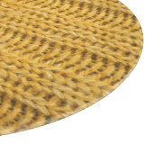 Geel gebreide trendy achtergrond snijplank (Hoek)