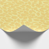 Geel gele glanzen boven pasteel cadeaupapier (Hoek)