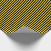 Geel goud en zwarte strips cadeaupapier (Hoek)