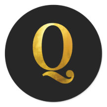 Geel goudoliemonogram Q op zwart