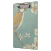 Geel, grijs en beige vogel op een bijkantoor klembord (Links)