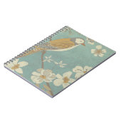 Geel, grijs en beige vogel op een bijkantoor notitieboek (Linkerzijde)