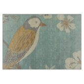 Geel, grijs en beige vogel op een bijkantoor snijplank (Voorkant)