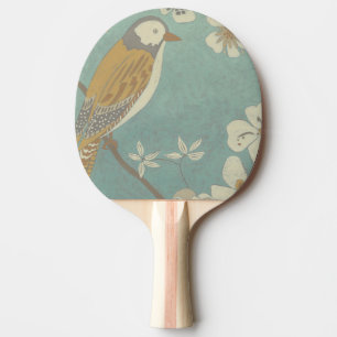Geel, grijs en beige vogel op een bijkantoor tafeltennisbatje