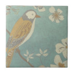 Geel, grijs en beige vogel op een bijkantoor tegeltje<br><div class="desc">Chariklia Zarris staat bekend om haar abstracte kunstwerken. In deze tekening van een profiel van een vogel op een blauwe blauwgroen achtergrond,  vatte ze de eenvoud van de vogel vast. De witte bloemen voegen een romantische aanraking toe. Pas uw favoriete Zazzle-product aan met dit prachtige afbeelding.</div>