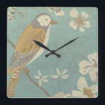 Geel, grijs en beige vogel op een bijkantoor vierkante klok<br><div class="desc">Chariklia Zarris staat bekend om haar abstracte kunstwerken. In deze tekening van een profiel van een vogel op een blauwe blauwgroen achtergrond,  vatte ze de eenvoud van de vogel vast. De witte bloemen voegen een romantische aanraking toe. Pas uw favoriete Zazzle-product aan met dit prachtige afbeelding.</div>