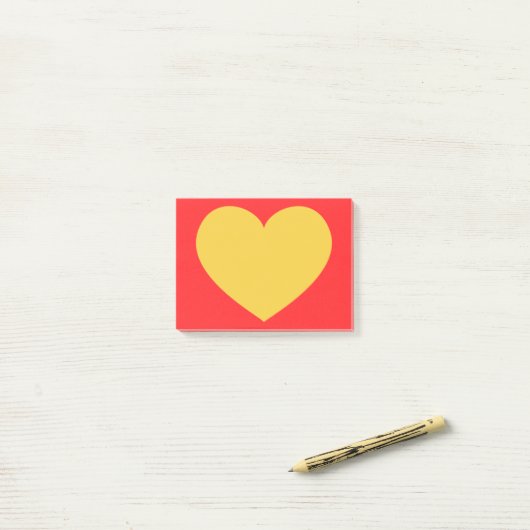 Geel hart post-it® notes (Op bureau)
