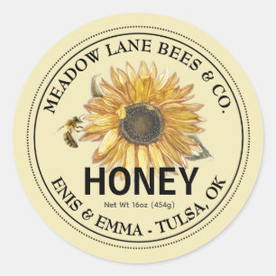 Geel honingetiket met zonnebloem en honingbij ronde sticker