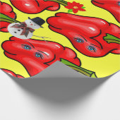 Geel kerstpapier met rode piepers cadeaupapier (Hoek)