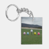 GEEL, PINK, BLAUW EN WITTE Golfkogels Sleutelhanger (Voorkant Links)