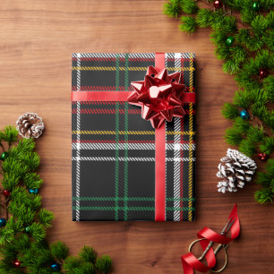 Geel, rood, groen en wit geplakt zwart geschiedeni cadeaupapier