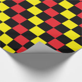 Geel, rood, zwart en geel cadeaupapier (Hoek)