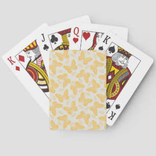 Geel vlinderpatroon op grijze achtergrond pokerkaarten