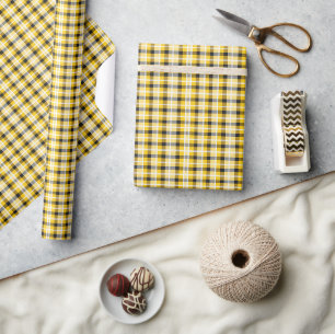 Geel, zwart en wit geplakt cadeaupapier