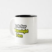 Geen angst, de gynaecoloog is hier tweekleurige koffiemok (Voorkant links)