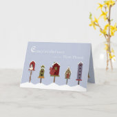 Gefeliciteerd met nieuwe thuishuizen en sneeuw kaart (Gele Bloem)