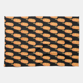 gefrituurd deeg op een stok theedoek