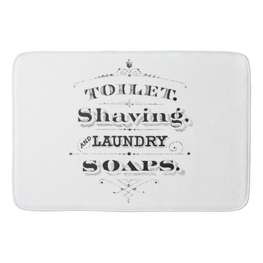  gegraveerde toiletartikelen en typografie badmat (Voorkant)