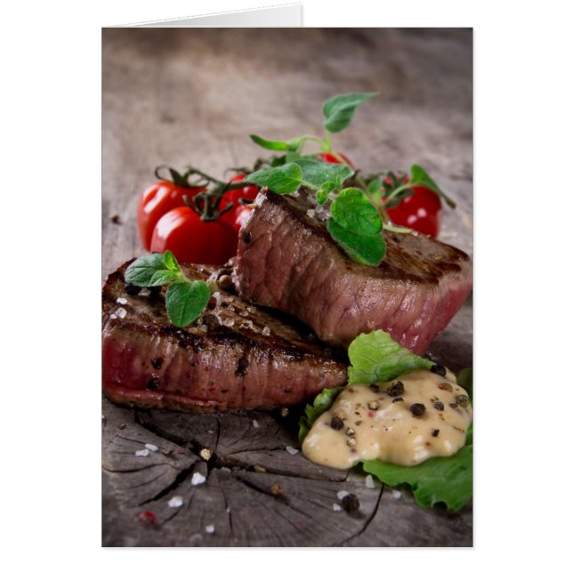 Gegrilde biefsteaks met verse kruiden en tomaten (Voorkant)