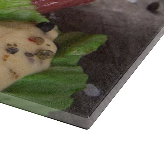 Gegrilde biefsteaks met verse kruiden en tomaten snijplank (Hoek)