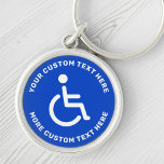 Gehandicapte gehandicapte symbooltekst blauw wit r sleutelhanger<br><div class="desc">Ronde gehandicapte sleutelhanger met wit gehandicapt symbool op een blauwe achtergrond en witte,  cirkelvormige tekst.</div>