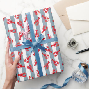 Geïllustreerde rode kreeften op lichte grijsblauwe cadeaupapier