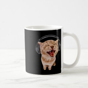 Gekke kat met hoofdtelefoon koffiemok