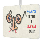 Gekke ogen neus bril ruikt nieuwe auto luchtverfrisser (Links)