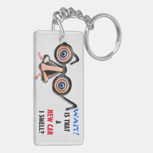 Gekke ogen neus bril ruikt nieuwe auto sleutelhanger