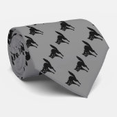 gekke zwarte kat met een achterste halveringse lol stropdas (Opgerold)