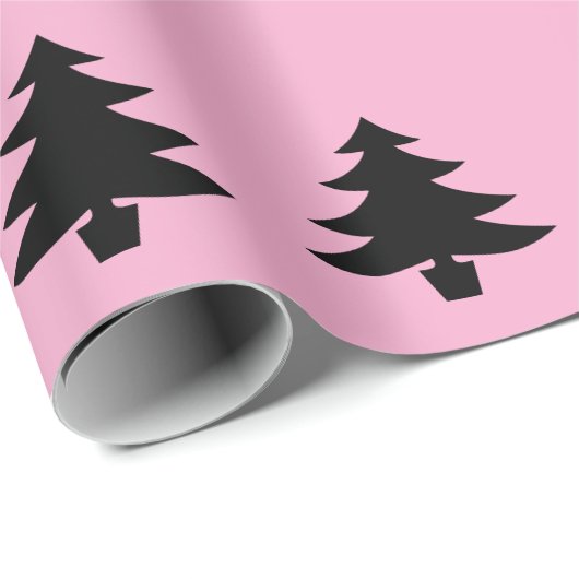 Gekke zwarte kerstbomen op lichtroze cadeaupapier (Rol Hoek)