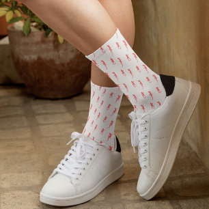 Gekko's in rood klimmen omhoog (op wit) sokken