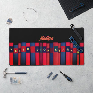 Gekleurde boeken, jouw naam, professioneel bureaumat