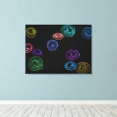 Gekleurde geleivis op zwarte achtergrond canvas afdruk (Insitu (Houten vloer))