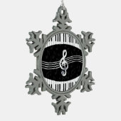 Gekromde pianosleutels en driehoekige hak tin sneeuwvlok ornament (Links)