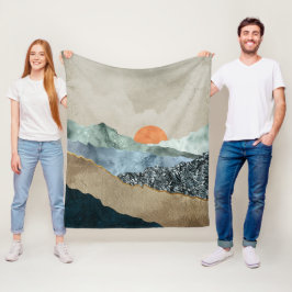 Gelaagde bergen met zonsondergangsgloed fleece deken