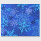 Gelaagde sneeuwvlokken op blauw cadeaupapier (Vlak)
