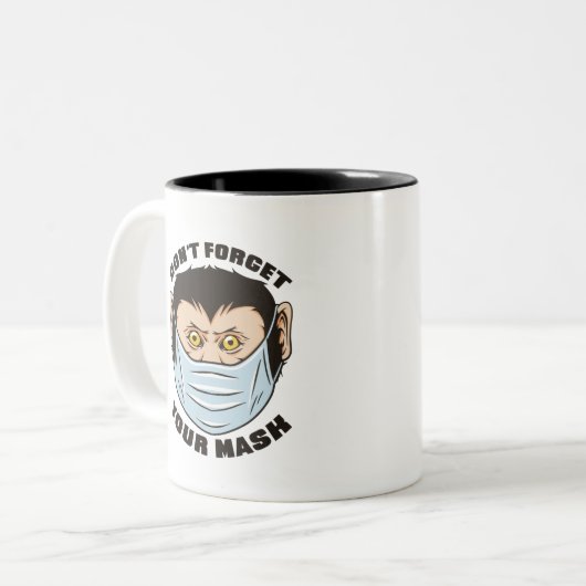GELD DAT MASKJE WEET, VERGEET JE MASKJE NIET TWEEKLEURIGE KOFFIEMOK (Voorkant links)