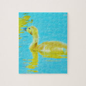 Gele Baby gans met lichtblauw water Legpuzzel (Verticaal)