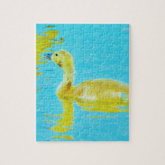 Gele Baby gans met lichtblauw water Legpuzzel (Verticaal)