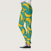 Gele banaan: zwarte omtrek leggings (Links)