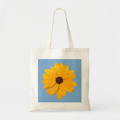 Gele bloem met blauwe achtergrond tote bag (Voorkant)