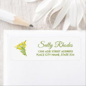 Gele bloem met groene bladeren op wit etiket (Insitu)