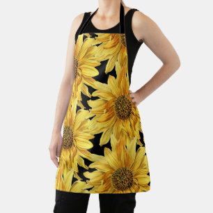 Gele bloemen op zwarte all-overprint schort