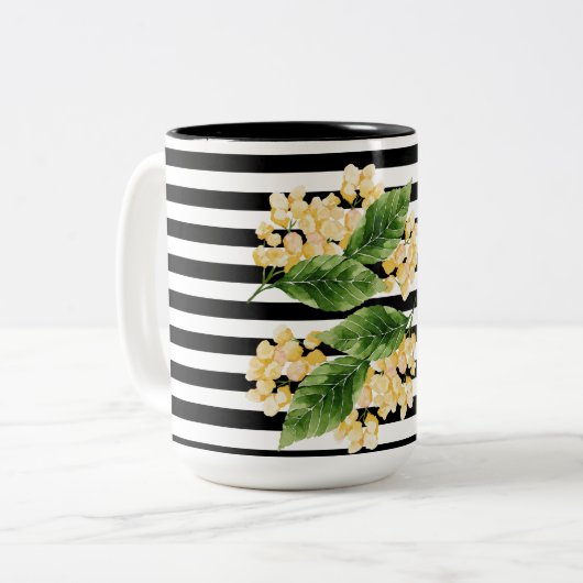 Gele bloemen op zwarte en witte strepen tweekleurige koffiemok (Voorkant links)