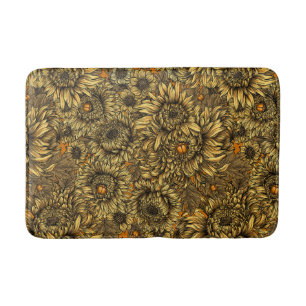 Gele chrysanthemumbloemen en oranje kevers badmat