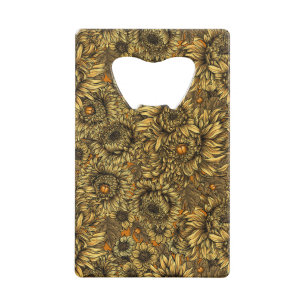 Gele chrysanthemumbloemen en oranje kevers creditkaart flessenopener