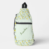 Gele citroenen en bladeren op groene achtergrond sling bag (Voorkant)