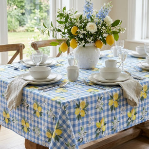 Gele citroenen en blauwe geruite gingham stof tafelkleed
